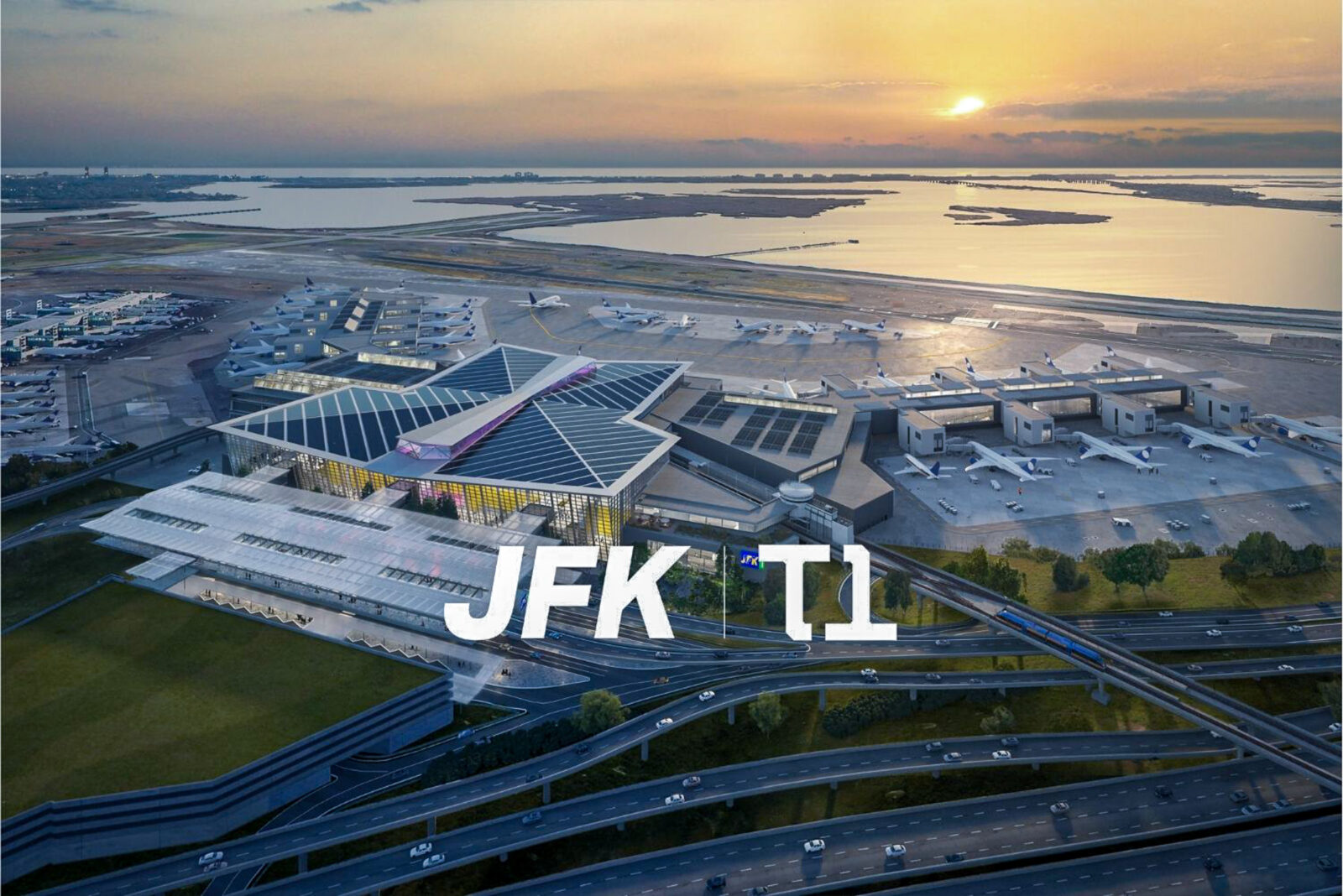 ภาพถ่ายทางอากาศมุมสูงของโครงการ New Terminal One (NTO) หรืออาคารผู้โดยสาร 1 (JFK T1) แสดงสถาปัตยกรรมหลังคาโค้งขนาดใหญ่และผังอาคารโดยรวม